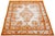 This is a Persian wool rug with an ivory base color, a medallion floral design, and orange accents. It is hand-knotted and...
