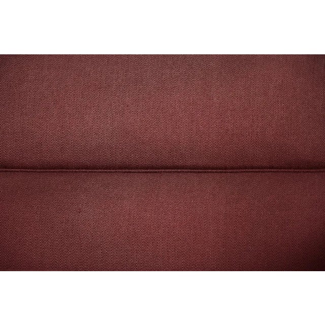 This three-seater sofa was made by the Swedish manufacturer Bröderna Anderssons during the 1950s. The sofa is upholstered...