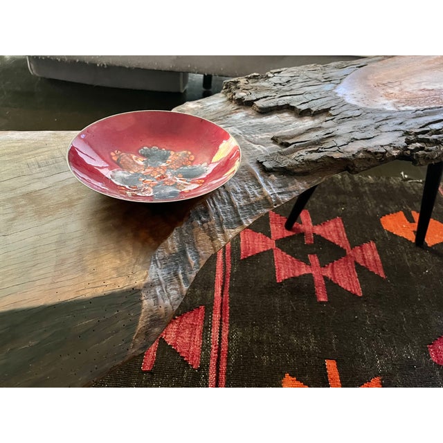 This walnut live edge coffee table has plenty of forest magic to resonate in your eclectic home. Matched with metal...