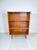 Freestanding bookcase with two height-adjustable shelves, made of teak in Denmark in the 1960s. The shelves can be...