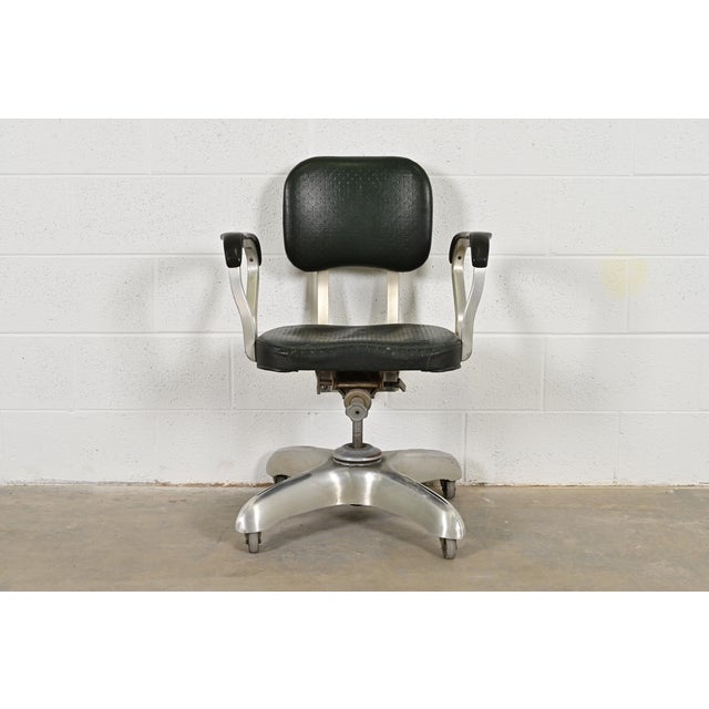A rare surviving Art Deco Machine Age or Mid-Century Modern executive office desk chair In the manner of Steelcase By Art...
