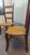 A lovely matched pair of antique French Provincial ladder-back nursing chairs, 19th century, in warm fruitwood (likely...