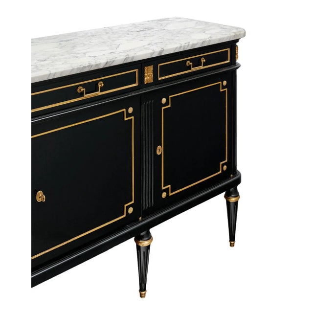 Buffet from France in the Louis XVI style. This enfilade is made of mahogany that has been ebonized and finished with a...