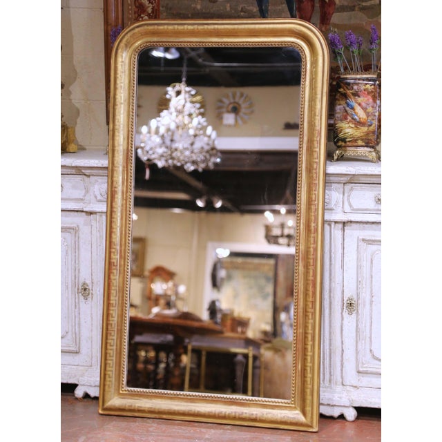 This elegant antique French Louis Philippe wall mirror was crafted in France circa 1850 and exemplifies the restrained...