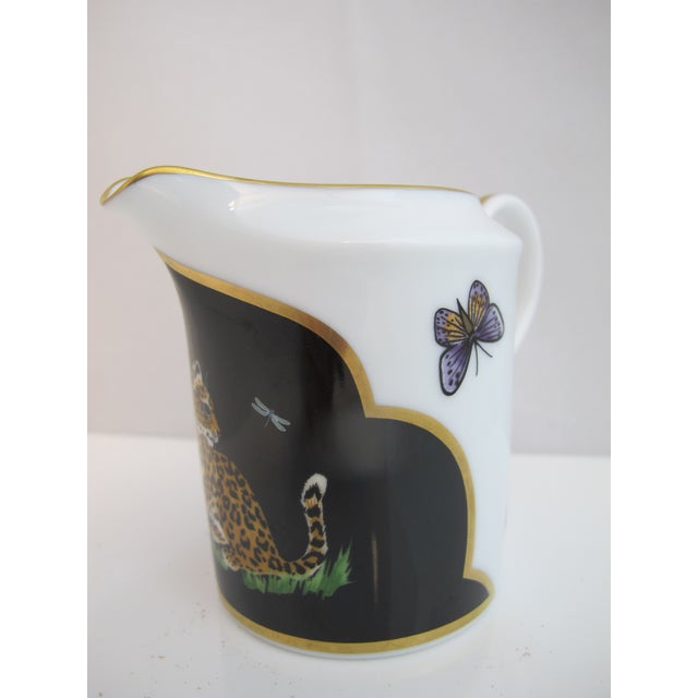 Incredibly sweet porcelain creamer pitcher from the Lynn Chase 1988 "Jaguar Jungle" collection. White porcelain shows a...