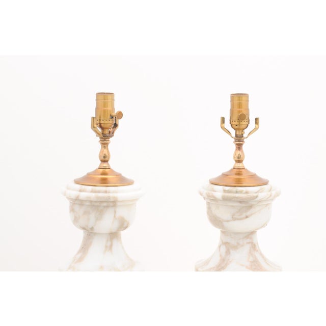 Pair of Exquisite 1930s Italian Marble Urns This elegant pair of Italian table lamps feature beautifully sculpted white...