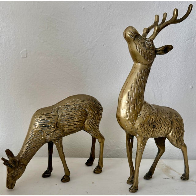 Elegant pair of vintage solid brass deer figurines featuring beautifully sculpted details and a warm, aged patina. Great...