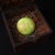 This is a fascinating and unique decorative object: a large, luminous green orb housed within a custom-fitted, intricately...