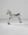 This antique wooden horse was crafted in France, circa 1900. Beautifully distressed, this svelte colt exhibits a joyous...