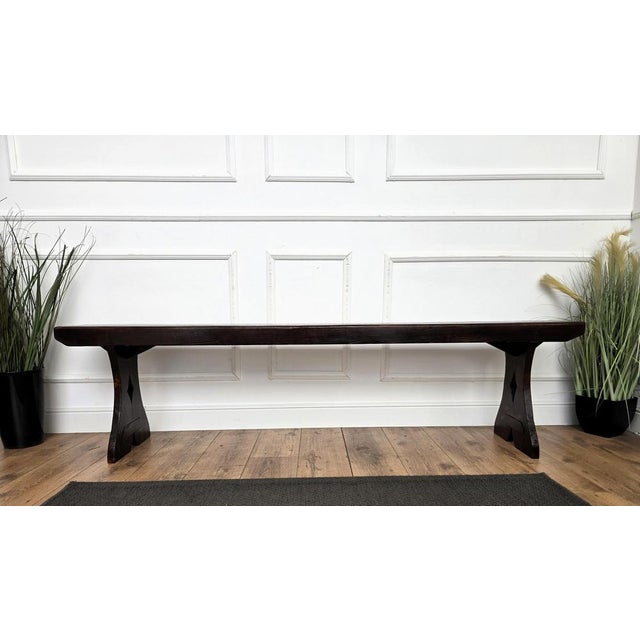 Beautiful Italian antique country wooden bench, with trestle style legs in original aged natural color giving the rich and...