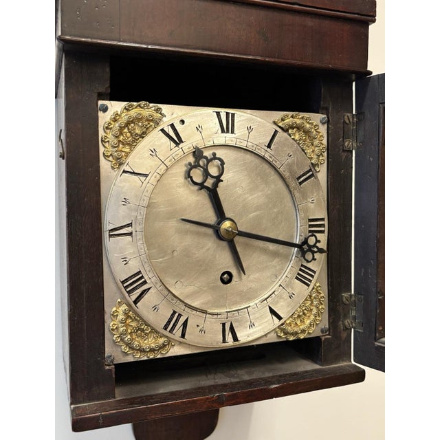 18th Century Mahogany Hooded Wall Clock, 6.5 Inch Dial. Sizes :- 45 cms tall, 21 cms wide, 16 cms depth Later fitted chain...