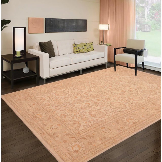 "Enhance the ambiance of your home with this magnificent Persian-influenced Turkish hand-knotted rug made by skilled...