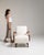 Bentwood-arm lounge chair in Warm Ivory Boucle. Its warm ivory boucle finish sets off curved wood open arms, ivory boucle...