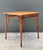 This vintage wood and rattan game table captures the effortless sophistication of Mid-Century Modern design through its...