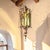 A finely crafted mid-century brass and iron hanging lantern inspired by Addison Mizner’s iconic Spanish Mediterranean...