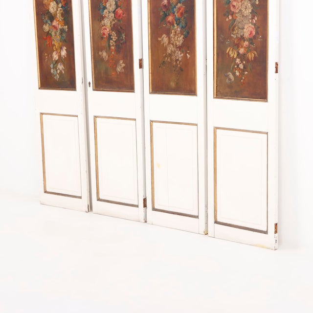 A charming set of four decorative wood panels, each hand-painted with colorful floral bouquets in the traditional European...