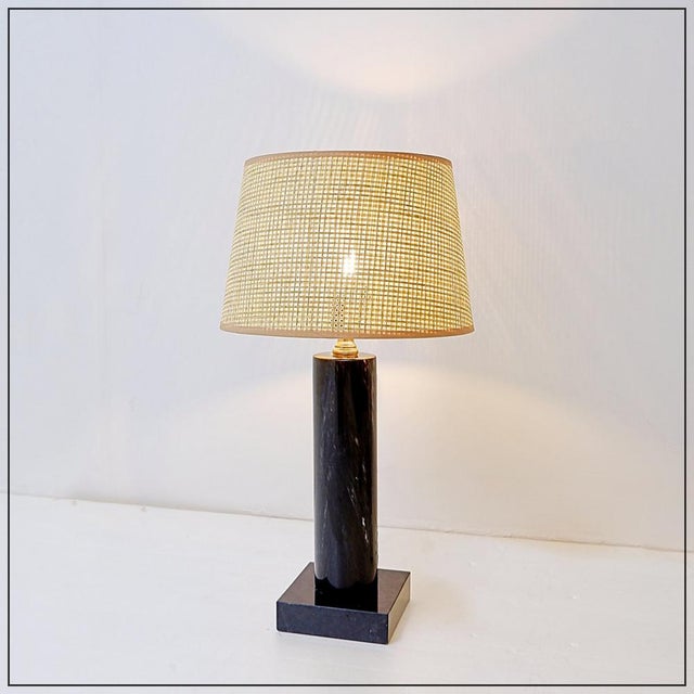 Table lamp - designer lighting New Raffia lampshade : Ø 28cm A black marble base enhanced with brass details and a...