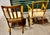 The primary chair is an Arts & Crafts style rocking chair, characterized by its sturdy wooden oak and embodies the design...