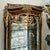 Showcase your most treasured collectibles in this magnificent French Louis XV Curio Display Cabinet, a luxurious statement...