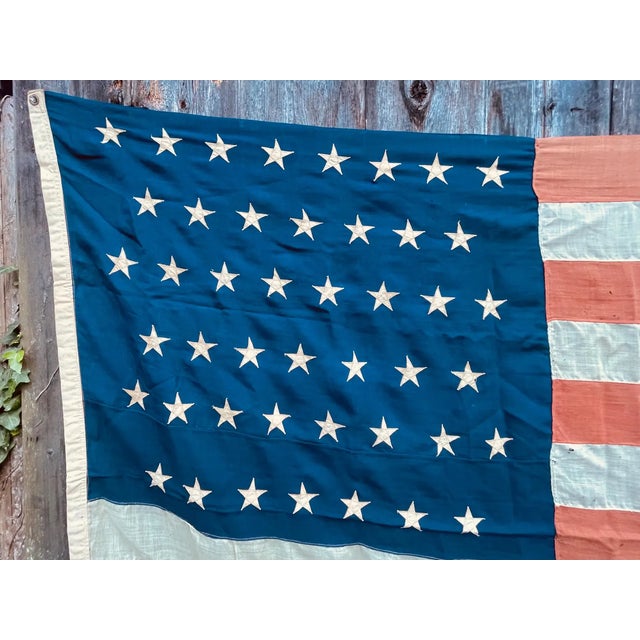 Very nice authentic Antique American flag. In a very desirable large size. A dramatic display for a large room. Excellent...