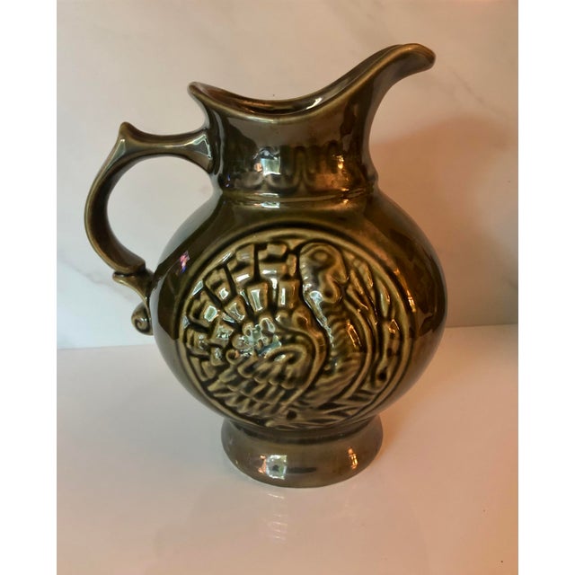 This 1968 McCoy (MCP) Glazed Pottery Turkey Pitcher has a beuatiful avocado green finish and is in excellent condition...