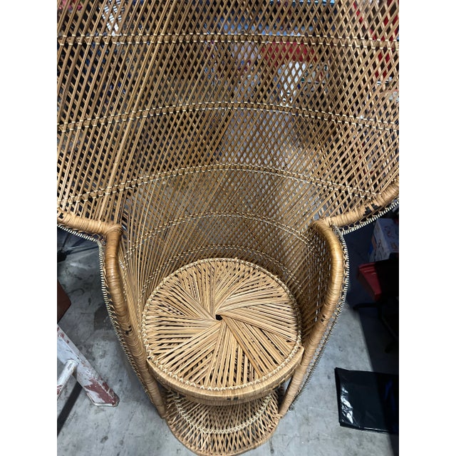 This is a beautiful wicker bohemian style peacock chair. This would be perfect for the interior designer or the enthusiast!
