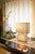 Andromeda is a metal table lamp made in Italy, characterized by a composition of overlapping volumes that create depth and...