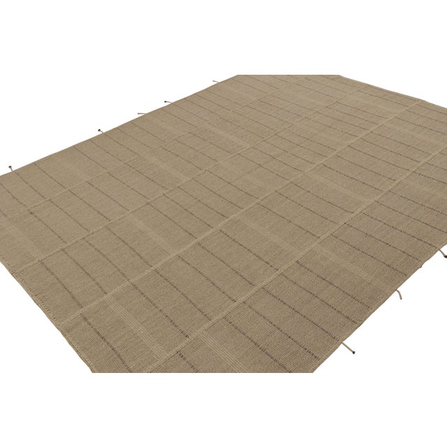 Handwoven in wool, a 9x12 Kilim design from an inventive new contemporary flat weave collection by Rug & Kilim. On the...