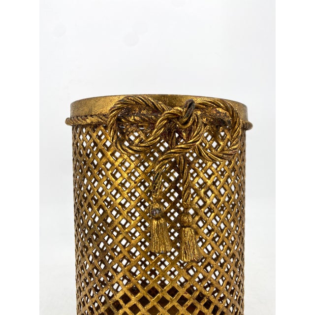 A wastepaper basket * by Li Puma, Florence * Style: Hollywood Regency * Gold-colored metal mesh * Elegant wastepaper...