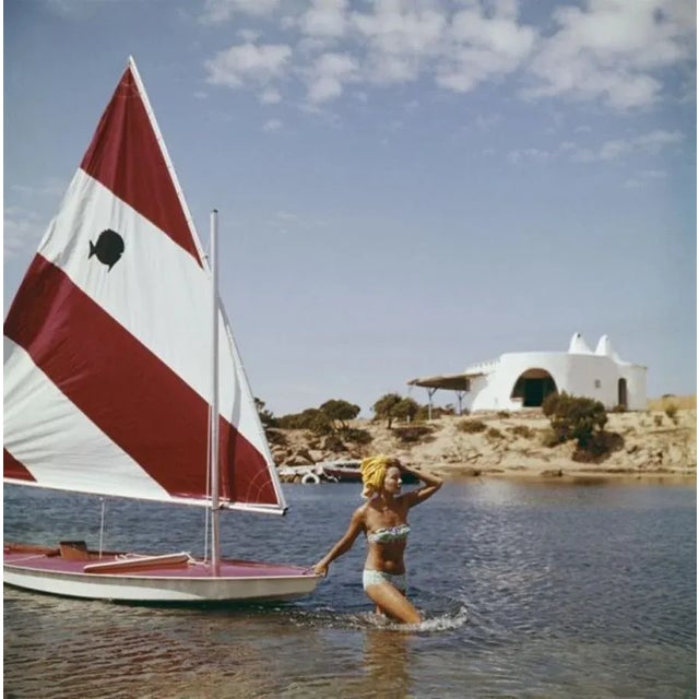 Bettina Graziani 1964 by Slim Aarons Slim Aarons Limited Estate Edition French fashion model Bettina Graziani wading in...