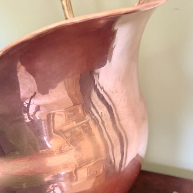 This lovely coal scuttle bucket was constructed in Holland of copper and brass with Delft ceramic handles. Use it at the...