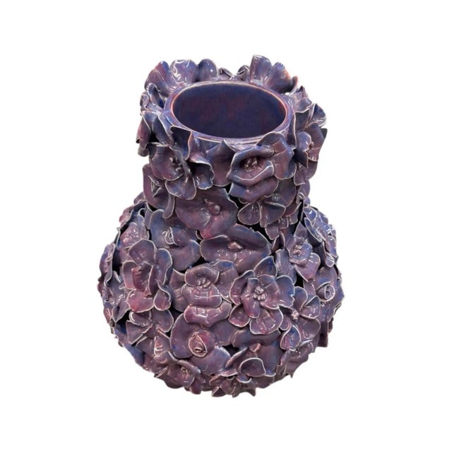Elevate your interior decor with this captivating vintage Italian ceramic vase, an extraordinary example of mid-century...