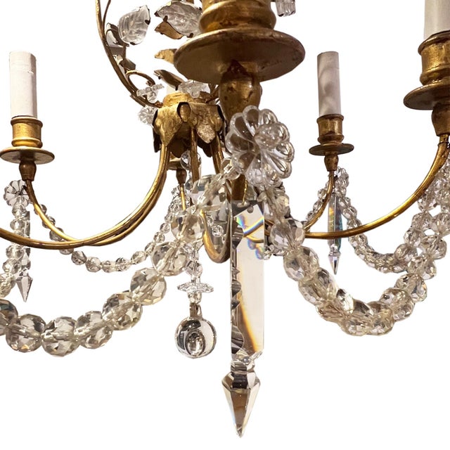 This lovely chandelier was made in France in the 1960s in the style of Maison Baguès. The elegant gilt metal frame is...