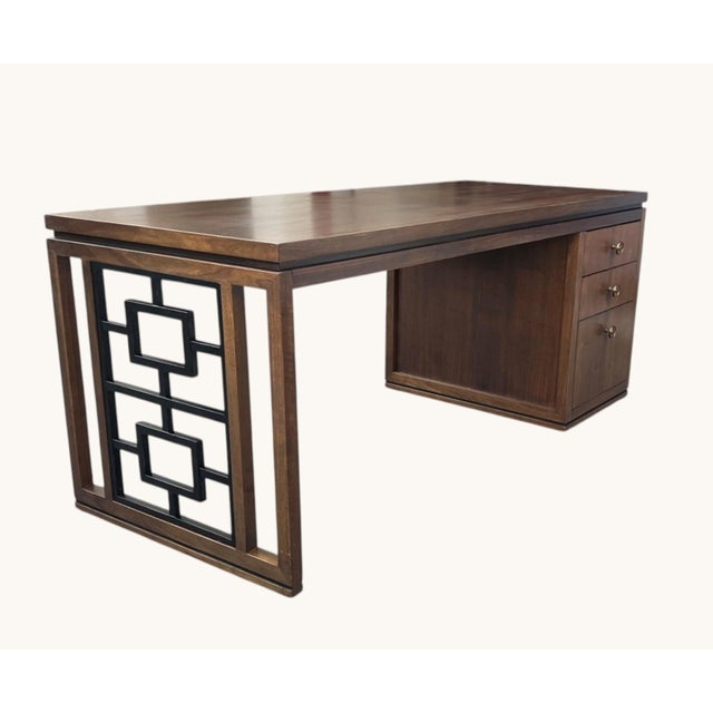 This striking vintage desk blends clean modern lines with bold geometric detail, offering a sophisticated statement piece...