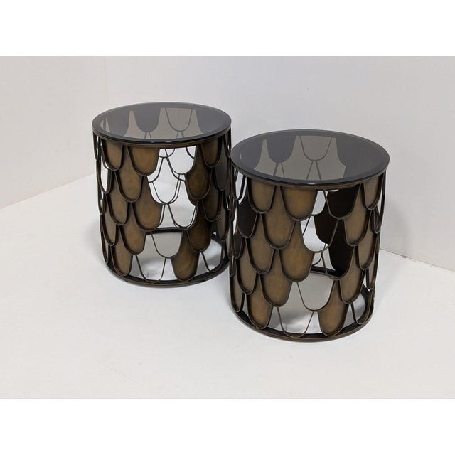 The Eichholtz Side Table L’indiscret takes design inspiration from the scale structure of the Koi carp fish. Scale infills...
