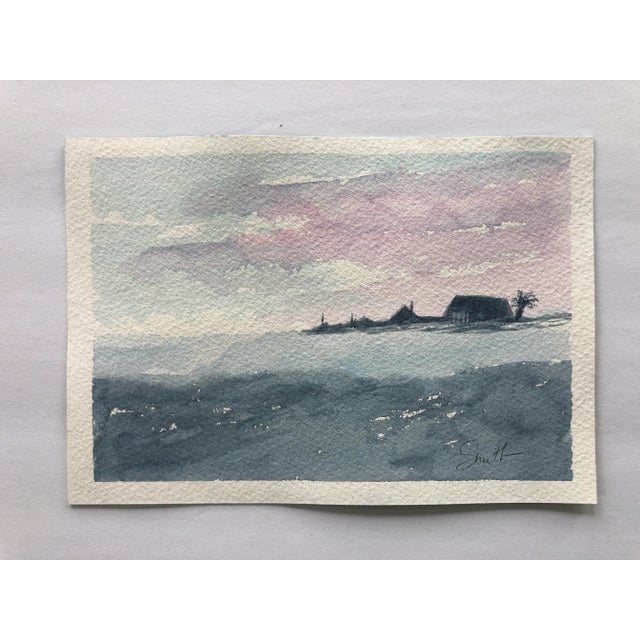 Subtle silhouette of an island against a pink and blue backdrop as day wanes. Standard size. Signed and ready to frame.