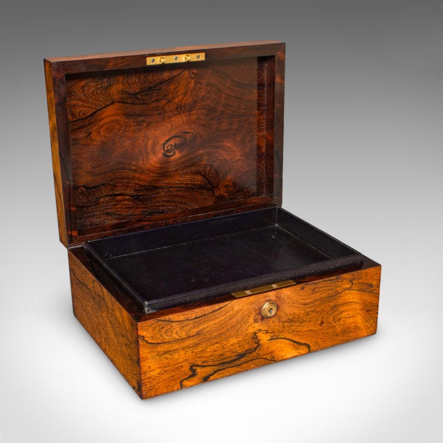 This is an antique gentleman’s document box. An English, rosewood and leather keepsake case, dating to the Regency period,...