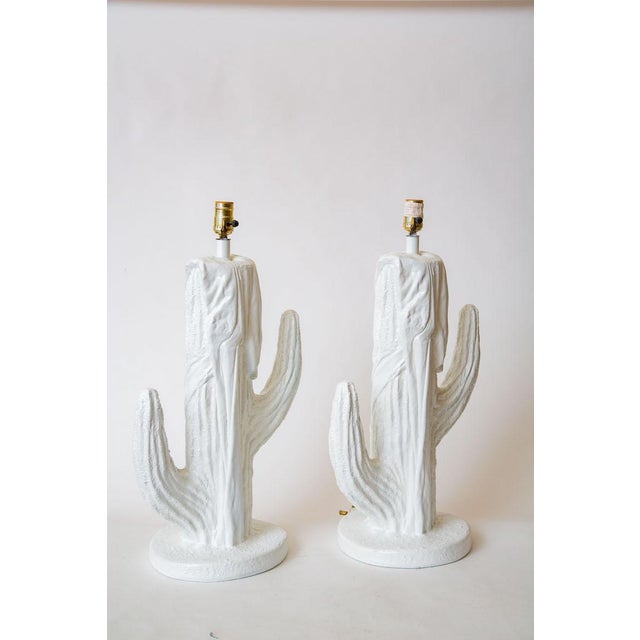 Offering a wonderful pair of 1970's vintage plaster of paris table lamps in the form of a cactus. They have weight and...