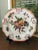 Offering a crackle finish, gold accented, reproduction plate in the "Duke of Gloucester" fruit & butterfly pattern. This...
