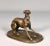 This delightful greyhound has been captured in a playful pose by the sculptor pierre-jules mène, one of the foremost...