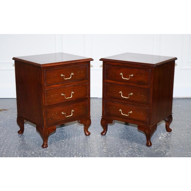 Stunning Pair of Brass Inlaid Anglo Indian Nightstands. These Anglo-Indian bedside tables are a truly stunning addition to...