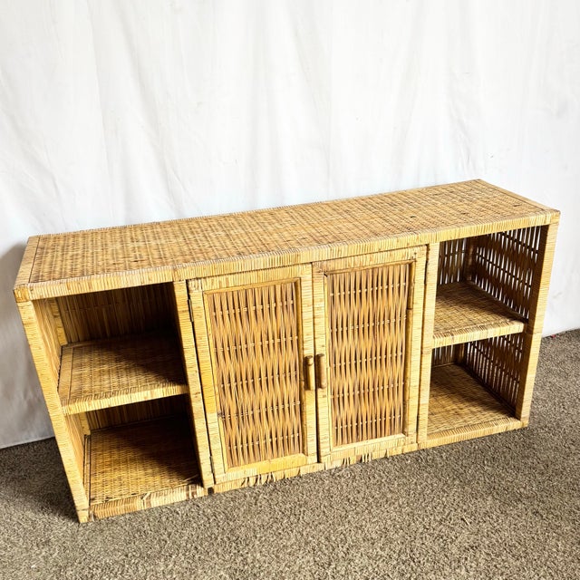 This vintage boho chic wicker credenza showcases beautifully woven natural wicker with clean architectural lines and a...