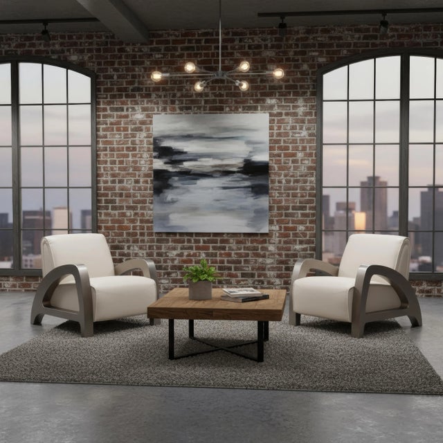 Upholstered in supple top-grain crystal white leather, it offers a sleek and sophisticated look that complements its...