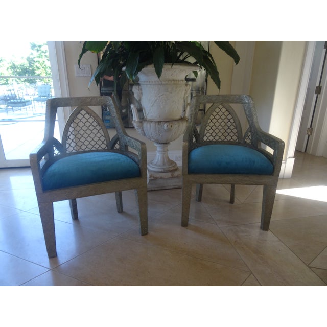 Vintage Hand Carved Teak Chairs clad in hand hammered metal with elegant pierced Jali Patterns backs inspired by the...