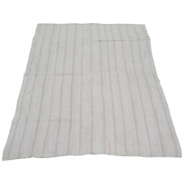 Flatweaved with care using traditional rug-making techniques, this hemp rug blends timeless craftsmanship with a modern...