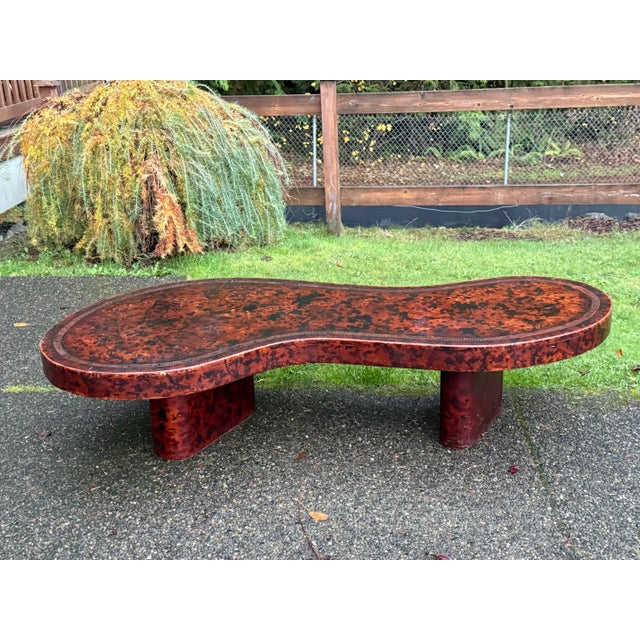 Unique Mid-Century Modern Coffee Table - Sculptural Design with leather finish on the top 69" Statement coffee table with...