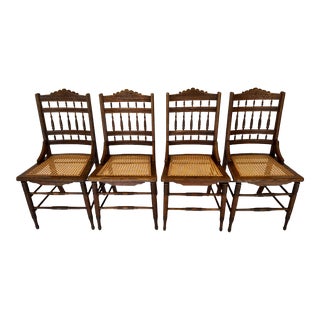 1940's Hand Carved Spindle Back Cane Seat Chairs, Set of 4 For Sale