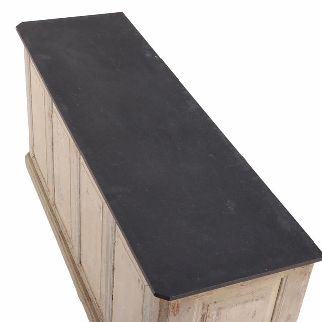 Featuring a newly installed Belgian bluestone top, this piece was originally crafted as a shop or work counter. It retains...