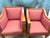 A gorgeous pair of vintage Biedermeier revival club chairs featuring elegant polished cherry wood frames and an...