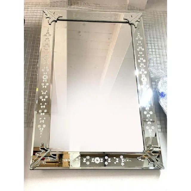 Spectacular Rectangular mirror with venetian hand-carved floreal design, fruit of very hight italian craftamnship. Murano...